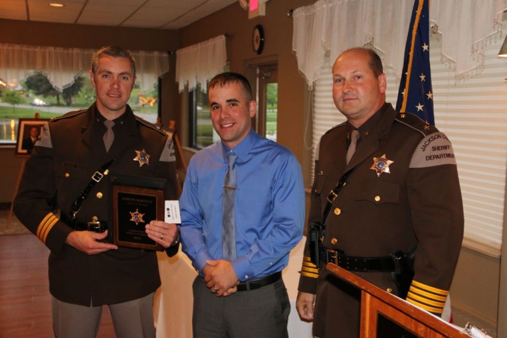 Jeremy Barnett, Deputy of the Year with Undersheriff Chris Kuhl and Sheriff Steve Rand