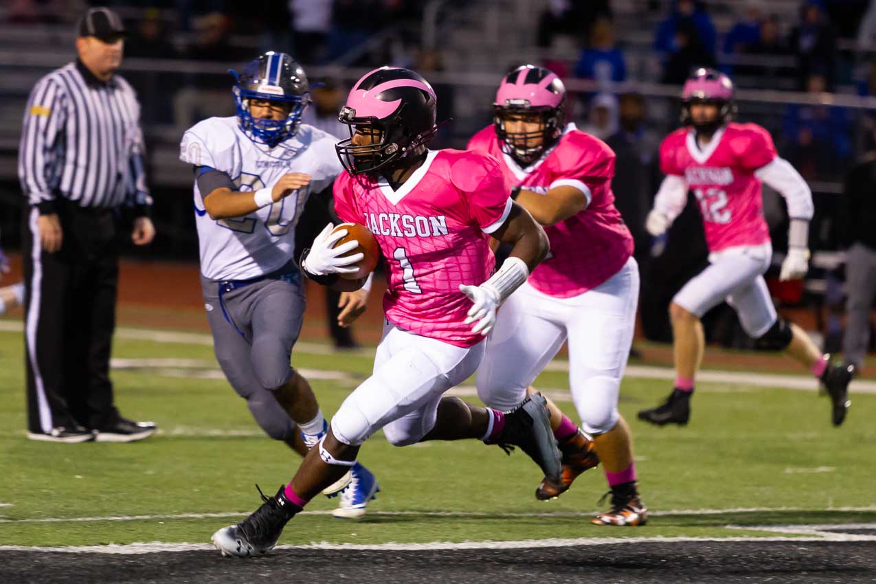 Jackson High vs Lincoln Pink Viking Project Football Game | Photo Gallery