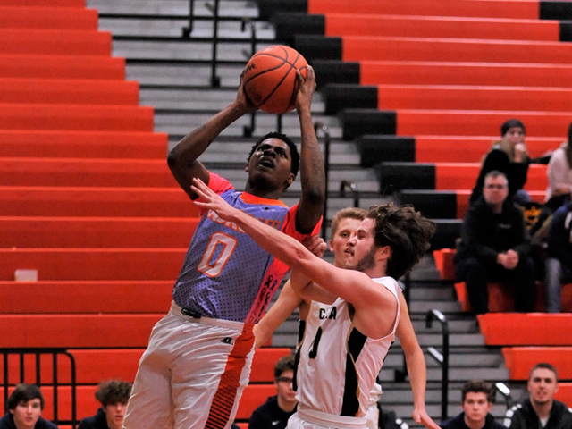 Tyler Hunt photo : Jackson High School player Tyler Hunt (0) scored 16 points in a 46-44 loss to Chelsea on Tuesday night at home.