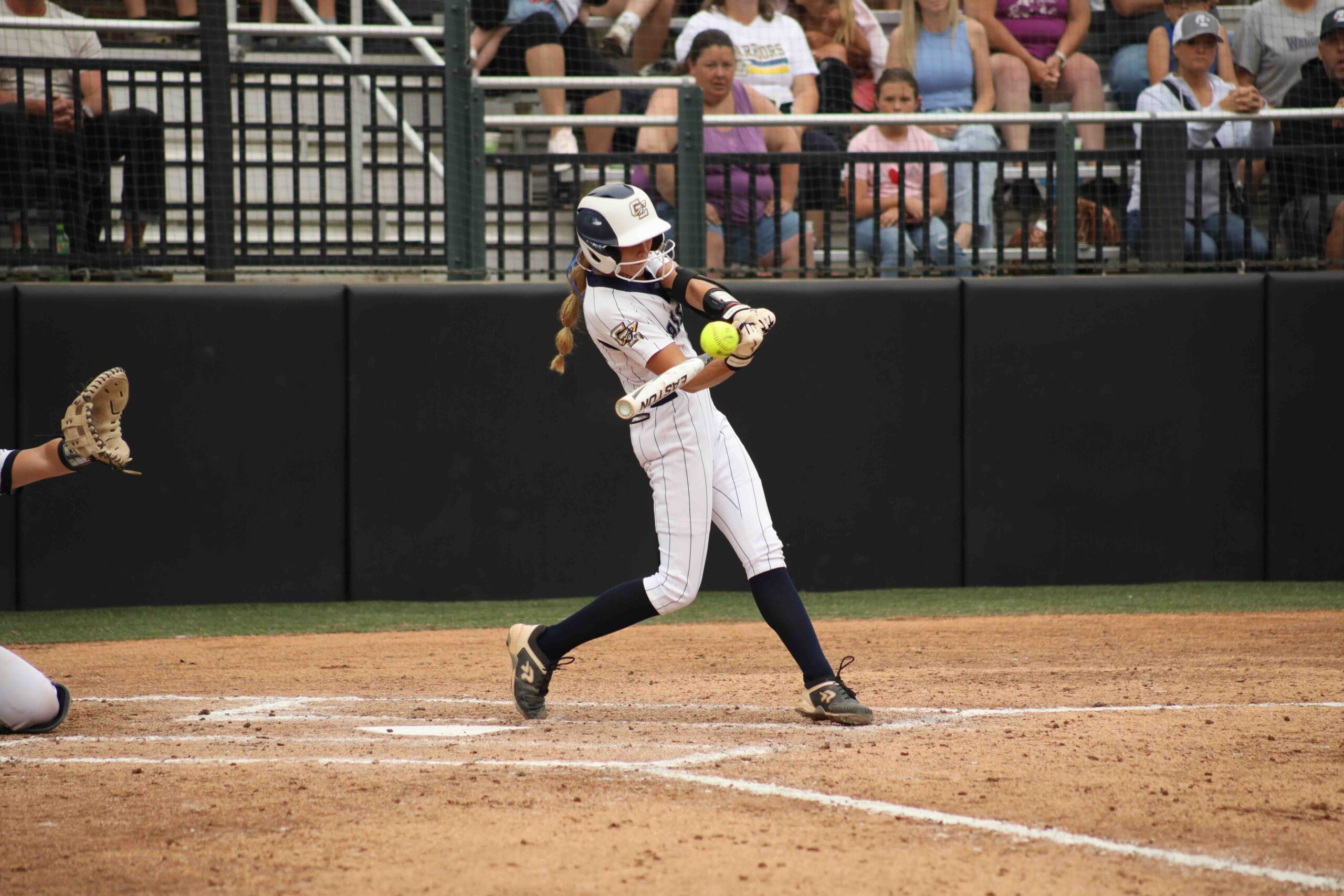 Conrad Strikes Out 11 Batters, Bats 2 Hits ; Warriors Advance to D3 Softball State Championship Game