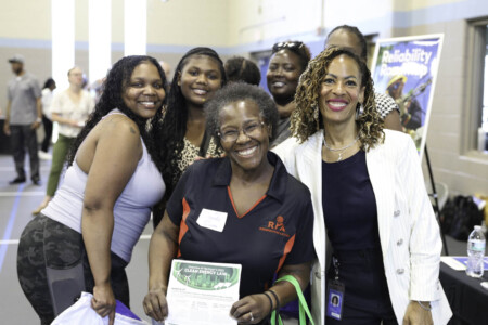 Angela Thompkins, Vice President External Affairs & Media Relations and Chief Diversity Officer for Consumers Energy (right) participates in the Energizing Equity Event, highlighting the “Green Giving" program at the Martin Luther King, Jr. Center in Jackson.